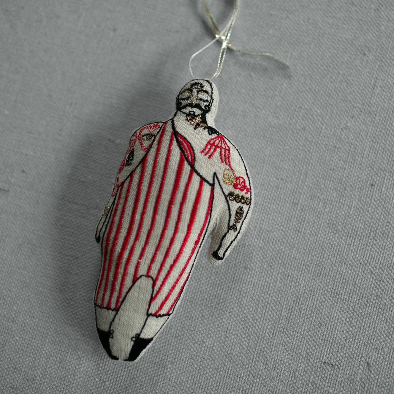 Tattooed Strong Man - Cotton-filled Ornament, Token